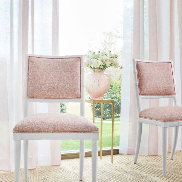 Sheer white curtains with a scenic window view by The Great Curtain Company in Austin, TX.