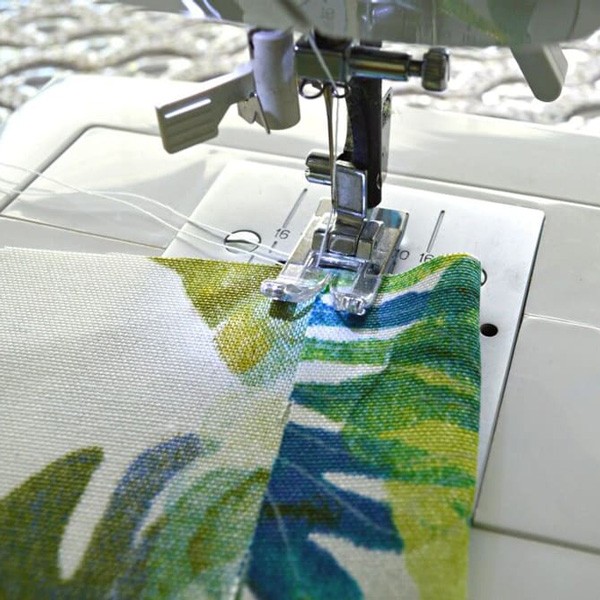 Professional sewing machine hemming custom curtain fabric in Austin, TX