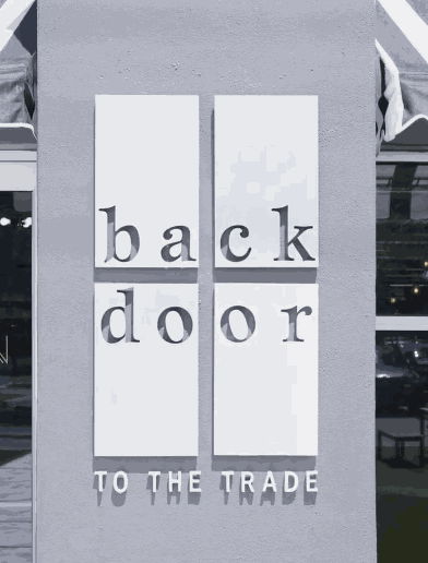 Backdoor to the Trade Textile Showroom Signage with Modern Fabric House in Austin, TX